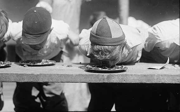 Children's Pie Eating Contest - 1923 - Credit: FordMaddoxFraud (via Wikimedia)