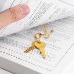 bigstockphoto_Open_Book_And_Golden_Key_Conc_493325