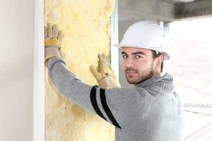 Worker Installing insulation