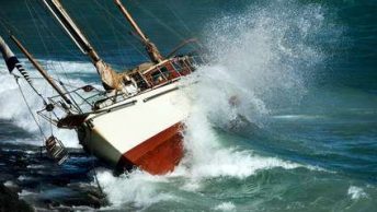 yacht crash on the rocks in stirmy weather