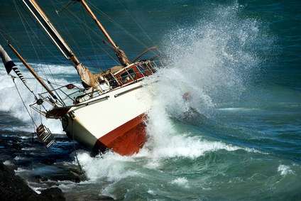 yacht crash on the rocks in stirmy weather