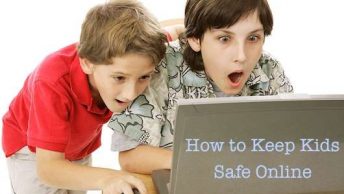 kids looking at computer