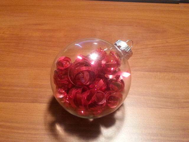 Filled glass ball Christmas ornament